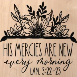 wood sign that says "His mercies are new every morning -Lam. 3:22-23" with flowers above it