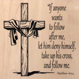 wood sign with an empty cross on the left and text on the right that says "If anyone wants to follow after me, let him deny himself, take up his cross, and follow me. Matthew 16:24"