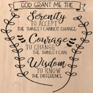 wood sign that says "God grant me the serenity to accept the things I cannot change. Courage to change the things I can. Wisdom to know the difference."