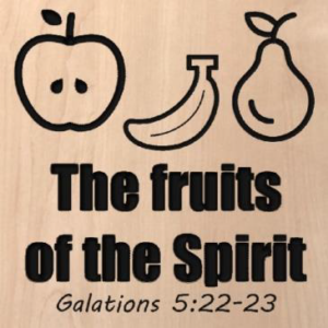 wood sign with fruit shapes on the top and "the fruit of the spirit, Galatians 5:22-23" written below it