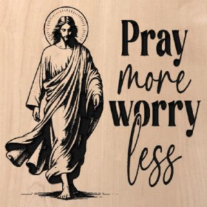 Wood sign that says "Pray more worry less" on the right side. With Jesus walking on the left side