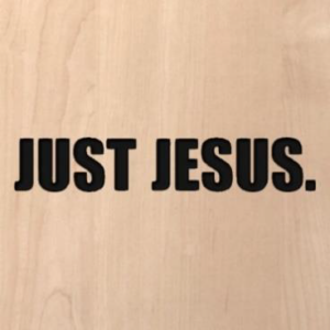 wood sign that says "just Jesus."