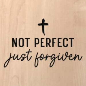 wood sign that says "not perfect just forgiven"