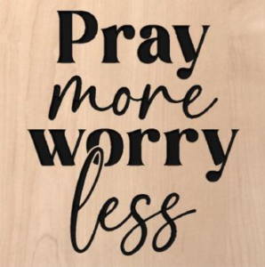wood sign that says "pray more worry less"