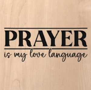 wood sign that says "Prayer is my love language"