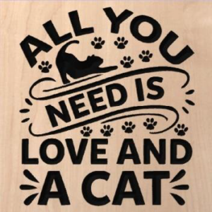 wood sign that says "all you need is love and a cat" with a cat stretching