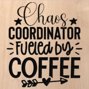 wood sign that says "chaos coordinator fueled by coffee"