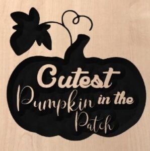 wood sign with "Cutest Pumpkin in the Patch" written inside pumpkin