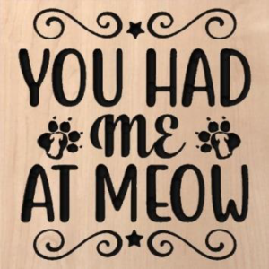 wood sign that says "you had me at meow"