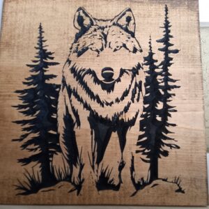 wood sign with realistic wolf standing straight forward with trees behind it