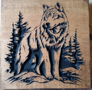 wood sign with realistic wolf standing on rocks in front of trees